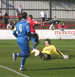 Hendry rounds keeper on way to number 2